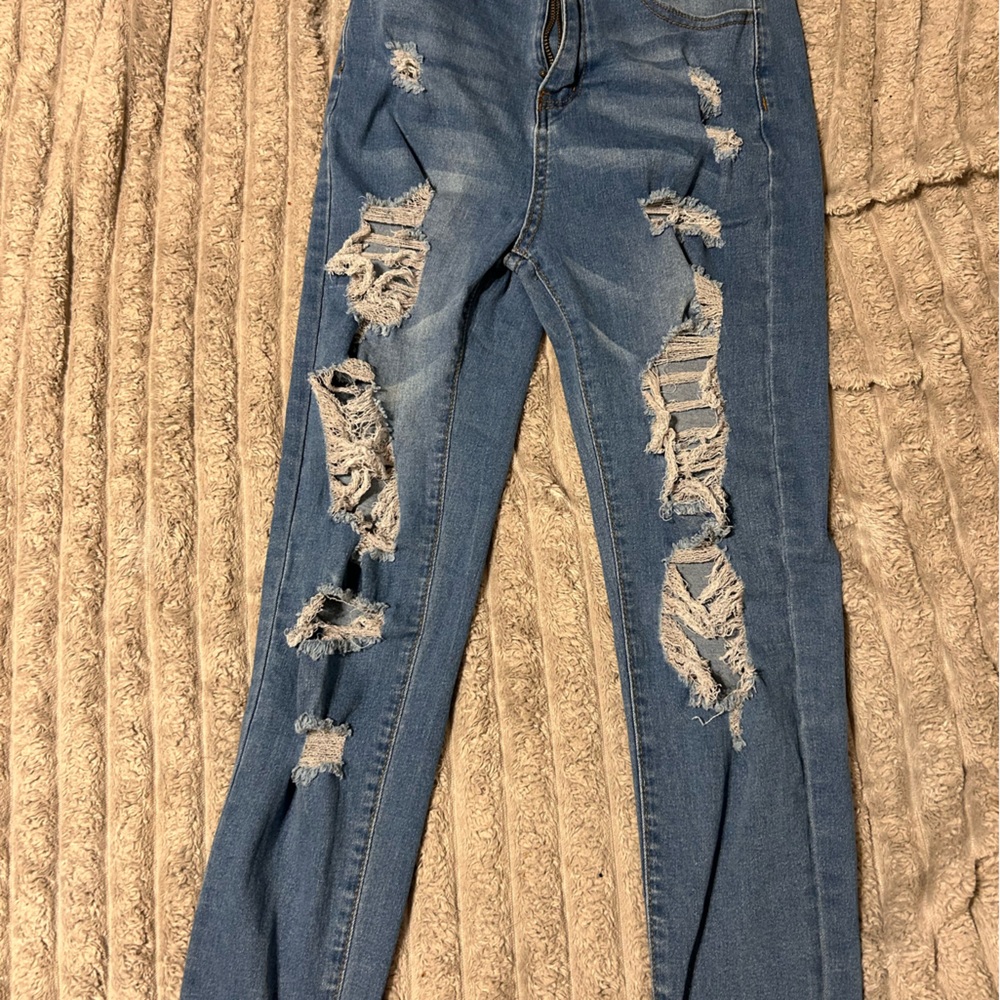 SHEIN ripped Blue Women's Jeans. 
Very comfy and stretchy.